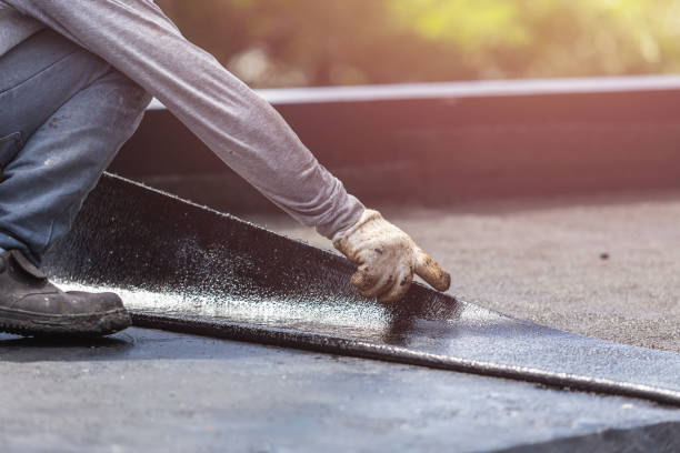 Professional Waterproofing technician working in Alden, NY